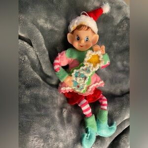 Elf shelf sitter pink green outfit red white stockings holding cookie #XT